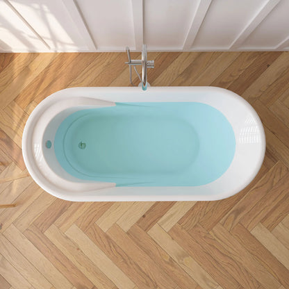 White acrylic freestanding soaking bathtub with chrome faucet and handheld shower on a wooden floor