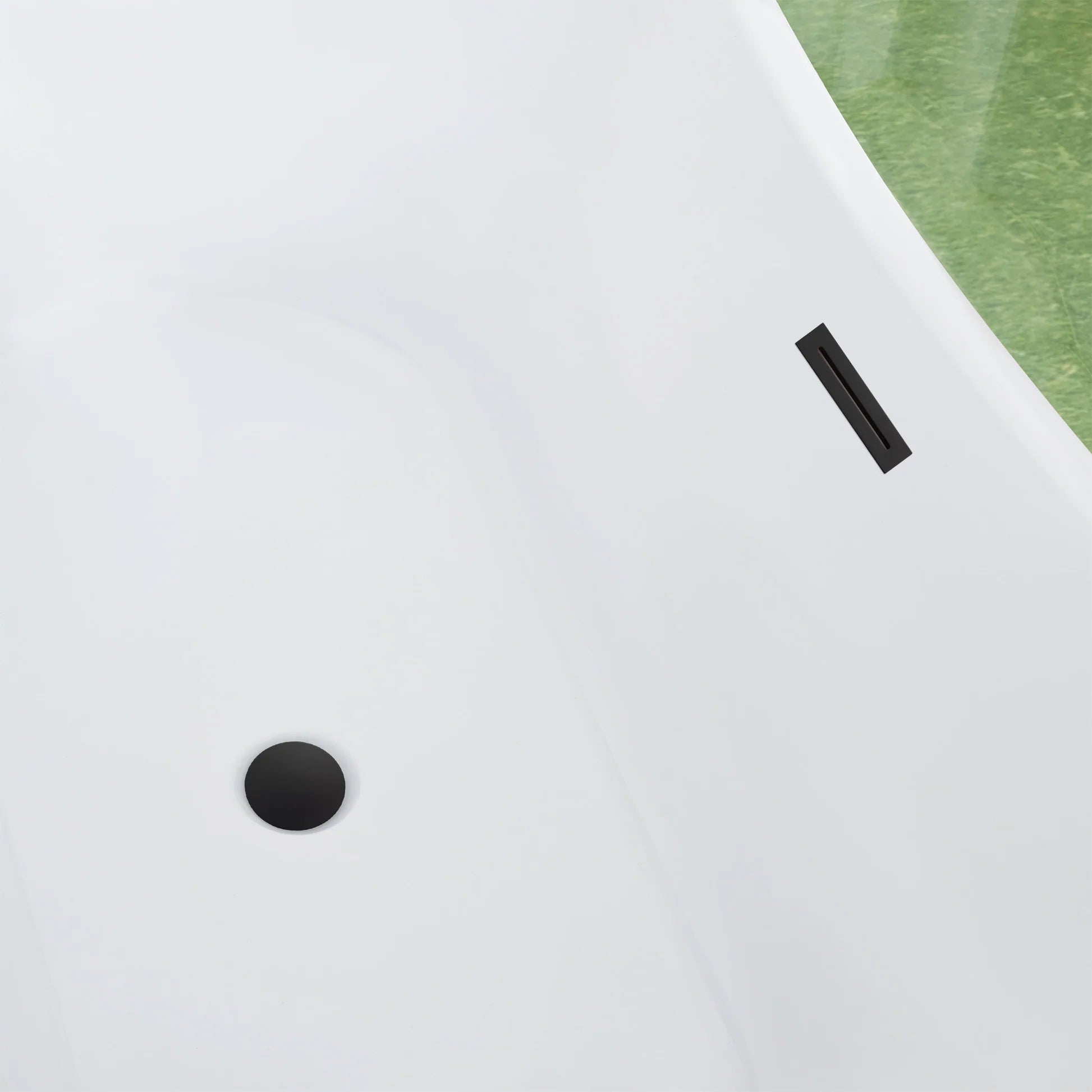 Freestanding Soaking Bathtub with Center Drain by Vanity Art